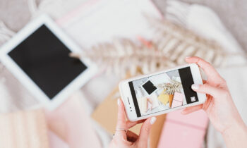 Influencer taking a photo hoping to make money on Instagram