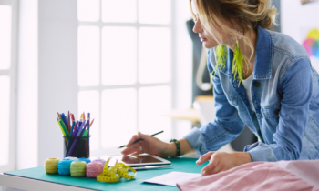 Fashion designer working her creative business from home