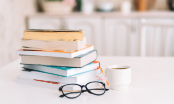 Stack of books on counter ready to be sold